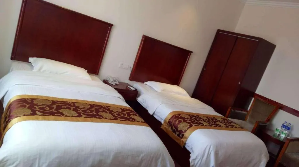 Bed in GreenTree Inn Shanghai Changxing Island Yuansha Fishing Port Hotel