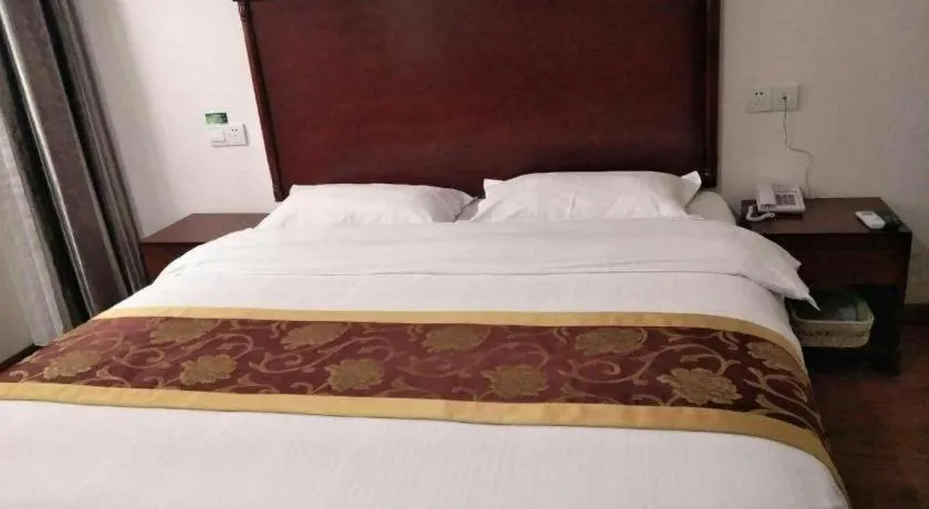 Bed in GreenTree Inn Shanghai Changxing Island Yuansha Fishing Port Hotel