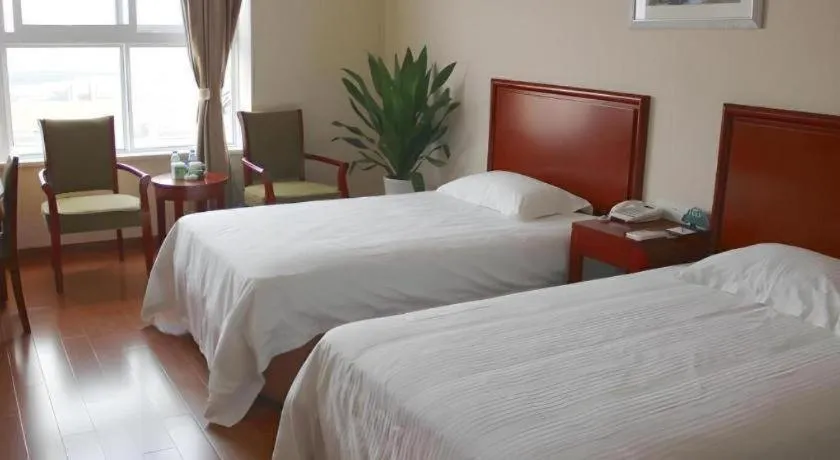 Bed in GreenTree Inn Shanghai Changxing Island Yuansha Fishing Port Hotel