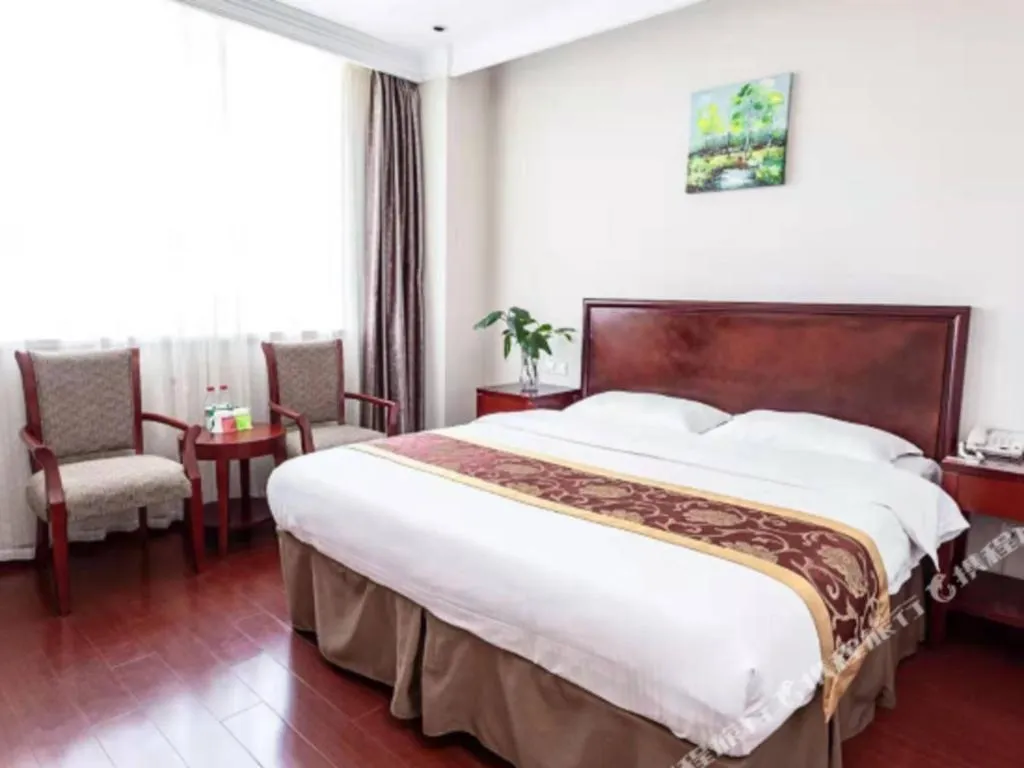 Bed in GreenTree Inn Shanghai Changxing Island Yuansha Fishing Port Hotel