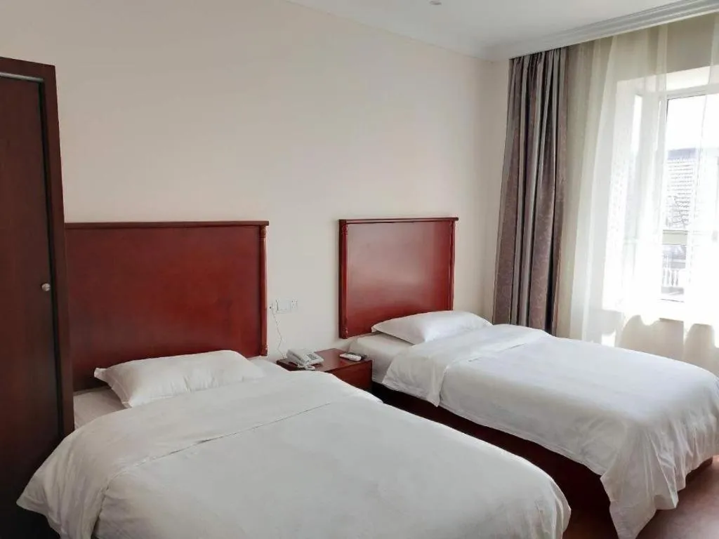 Bed in GreenTree Inn Shanghai Changxing Island Yuansha Fishing Port Hotel