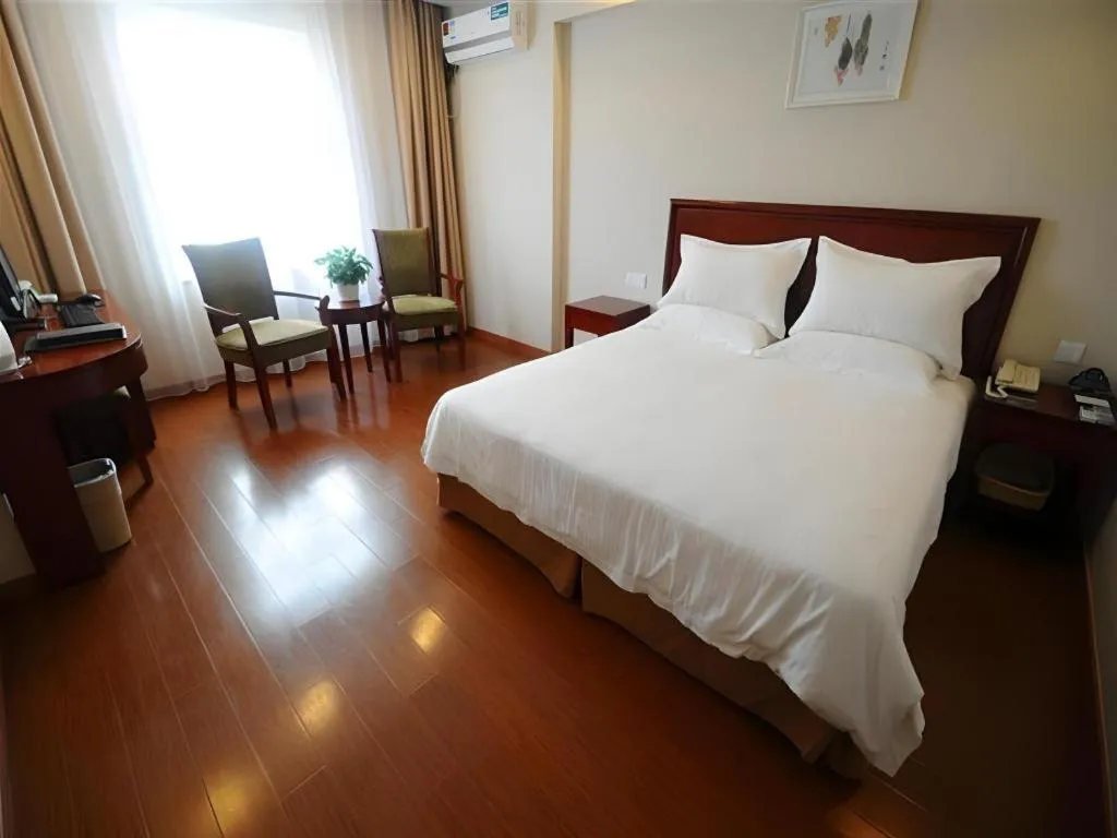 Bed in GreenTree Inn Shanghai Changxing Island Yuansha Fishing Port Hotel