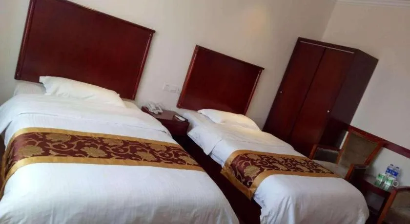 Bed in GreenTree Inn Shanghai Changxing Island Yuansha Fishing Port Hotel