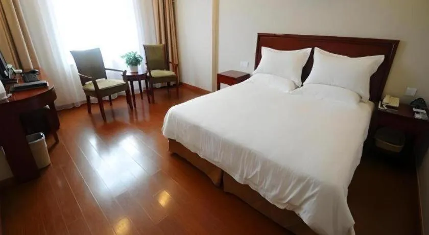 Bed in GreenTree Inn Shanghai Changxing Island Yuansha Fishing Port Hotel
