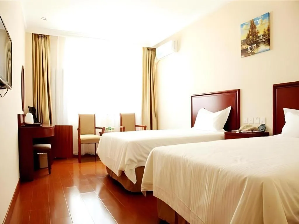 Bed in GreenTree Inn Shanghai Changxing Island Yuansha Fishing Port Hotel