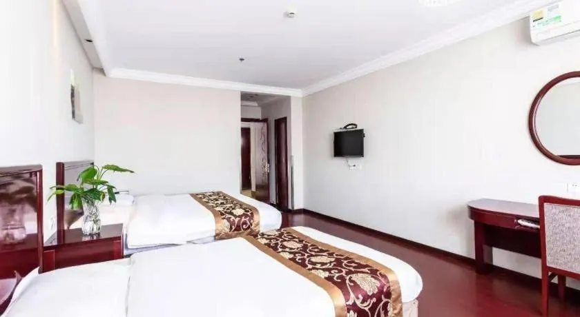 Bed in GreenTree Inn Shanghai Changxing Island Yuansha Fishing Port Hotel