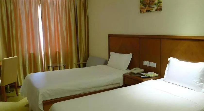 Bed in GreenTree Inn Shanghai Caohejing Development Zone Songjiang Park Jiuxin Road Business Hotel