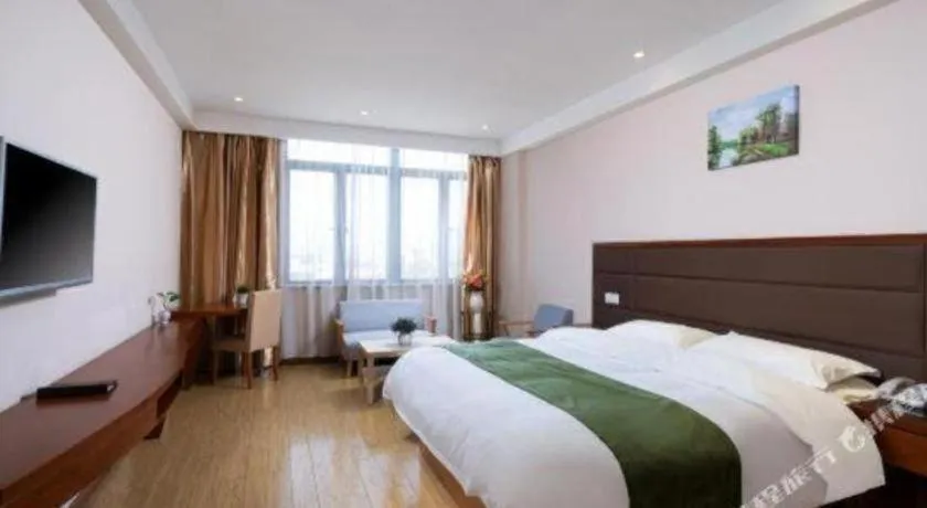 Bed in GreenTree Inn Shanghai Caohejing Development Zone Songjiang Park Jiuxin Road Business Hotel