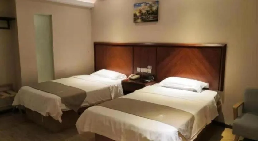 Bed in GreenTree Inn Shanghai Caohejing Development Zone Songjiang Park Jiuxin Road Business Hotel