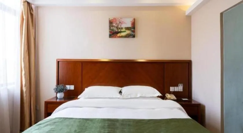 Bed in GreenTree Inn Shanghai Caohejing Development Zone Songjiang Park Jiuxin Road Business Hotel