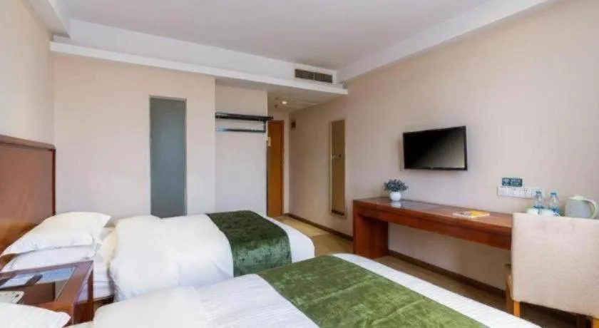 Bed in GreenTree Inn Shanghai Caohejing Development Zone Songjiang Park Jiuxin Road Business Hotel