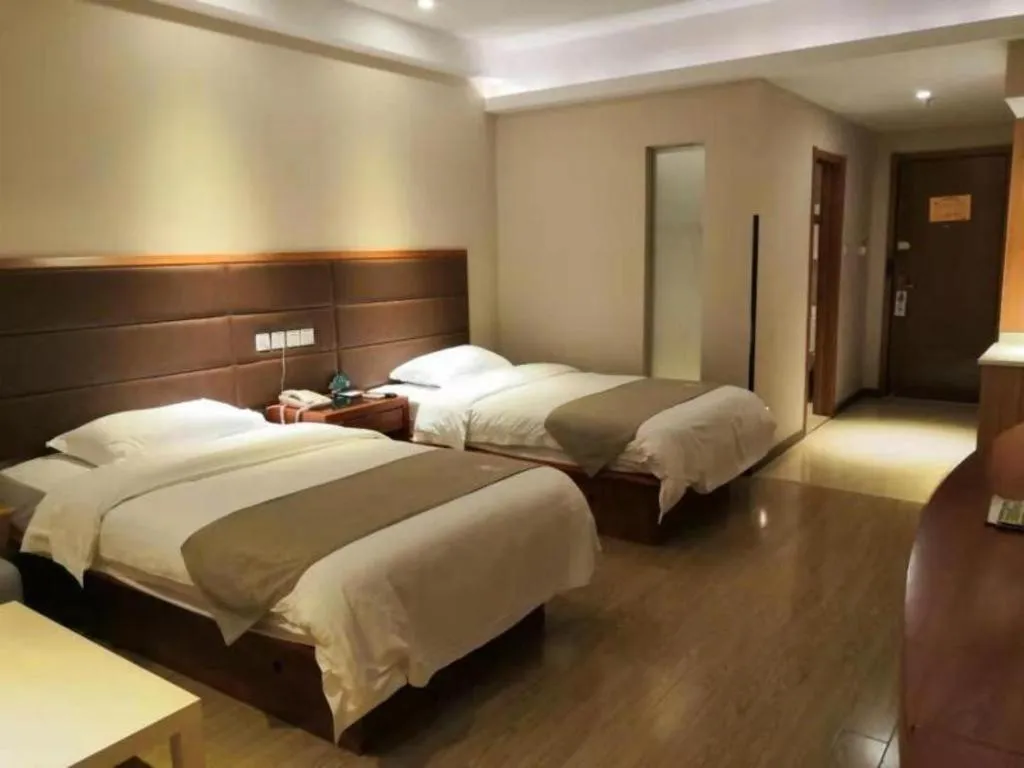 Bed in GreenTree Inn Shanghai Caohejing Development Zone Songjiang Park Jiuxin Road Business Hotel