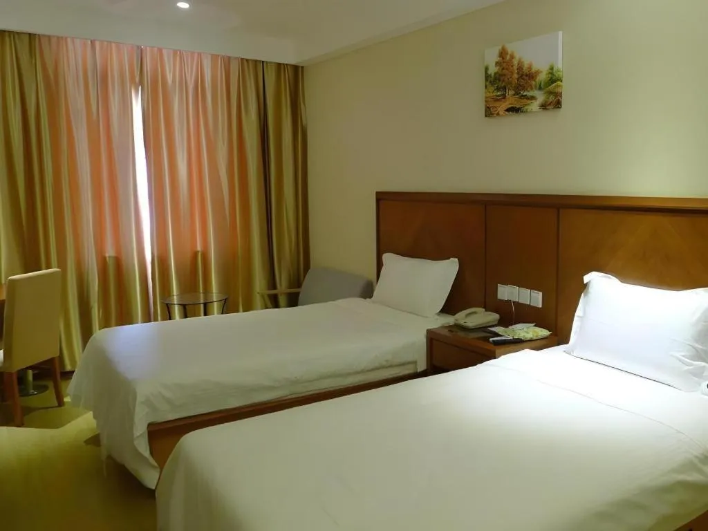 Bed in GreenTree Inn Shanghai Caohejing Development Zone Songjiang Park Jiuxin Road Business Hotel