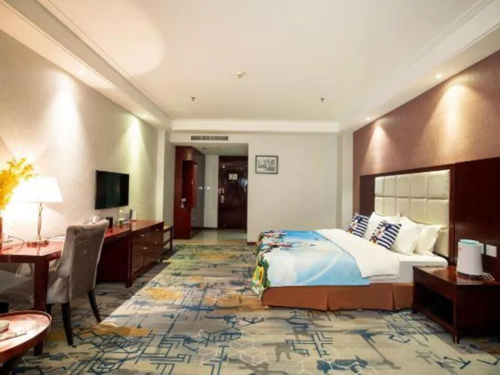 Bed in Xinxiang Zhongzhou Yihe Hotel