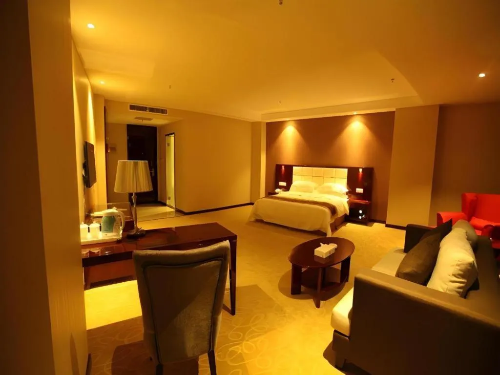 Bed in Xinxiang Zhongzhou Yihe Hotel