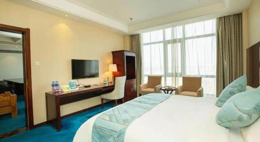 Bed in Xinxiang Zhongzhou Yihe Hotel