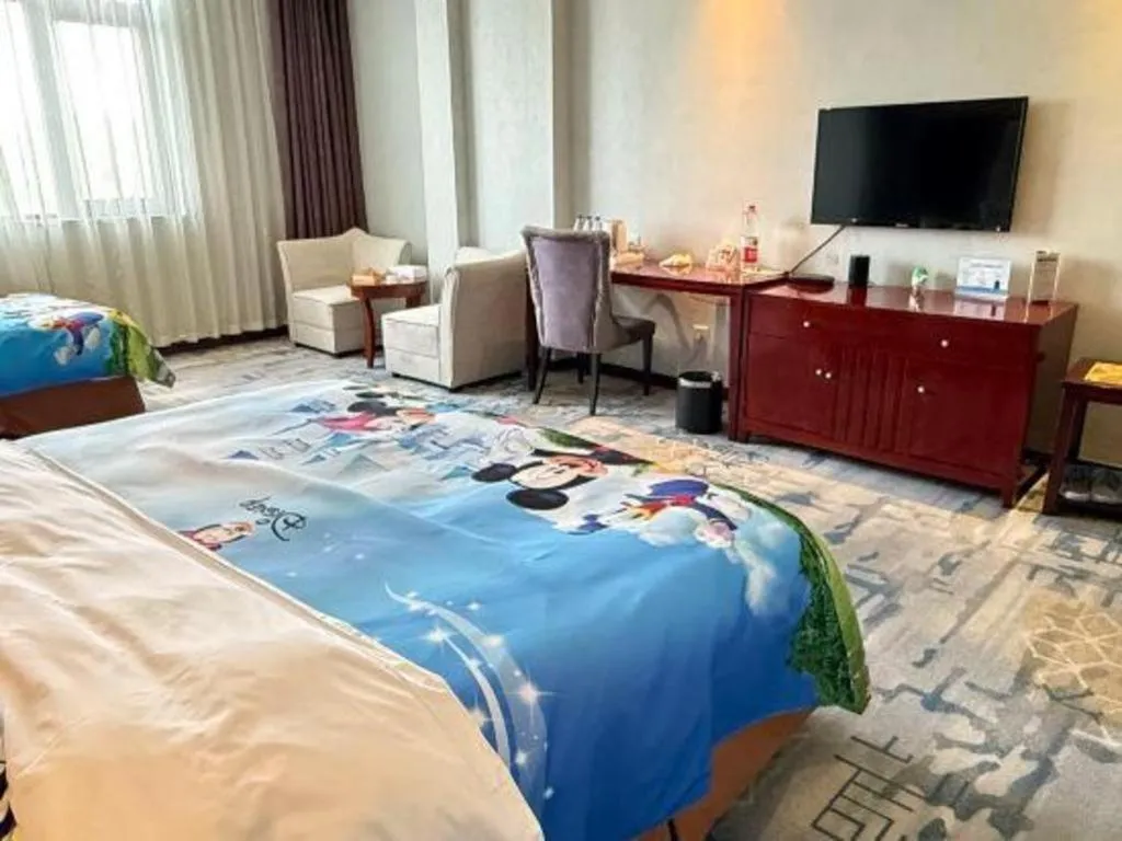 Bed in Xinxiang Zhongzhou Yihe Hotel