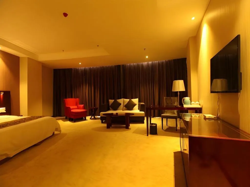 Bed in Xinxiang Zhongzhou Yihe Hotel