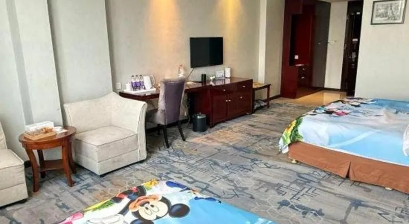 Bed in Xinxiang Zhongzhou Yihe Hotel