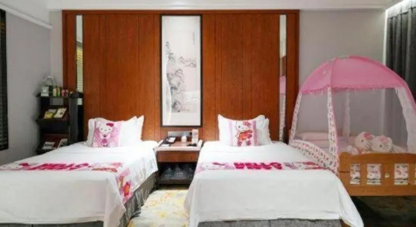 Bed in Jiyuan Oriental Jianguo Hotel