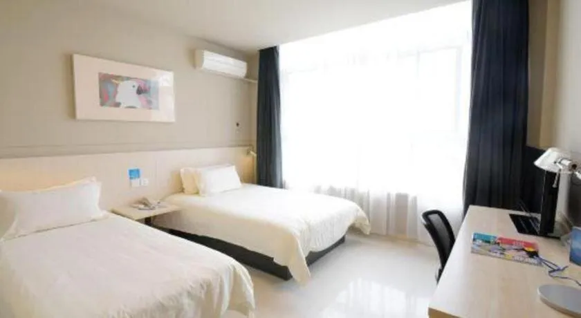 Bed in Jinjiang Inn Tai Zhou Xinghua Yingwu Bridge Branch