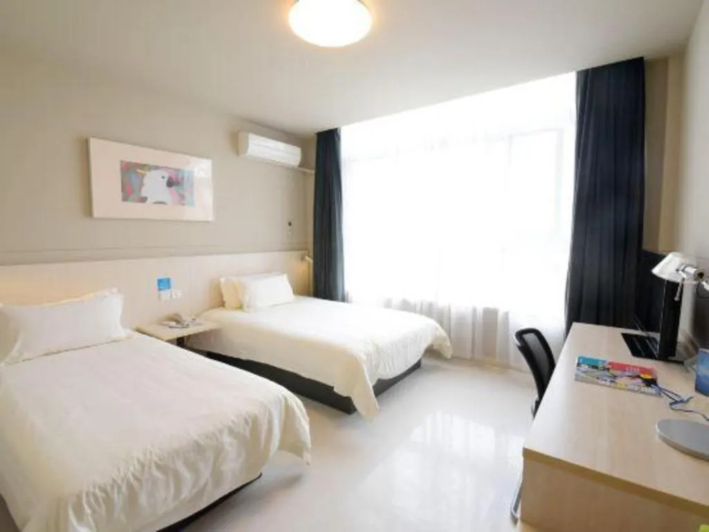 Bed in Jinjiang Inn Tai Zhou Xinghua Yingwu Bridge Branch