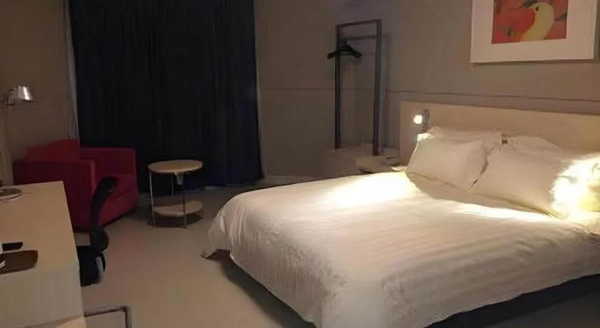 Bed in Jinjiang Inn Tai Zhou Xinghua Yingwu Bridge Branch