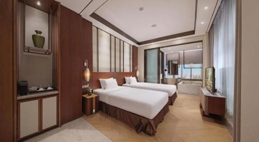 Bed in Fliport Hotel Zhangzhou Yuanshan