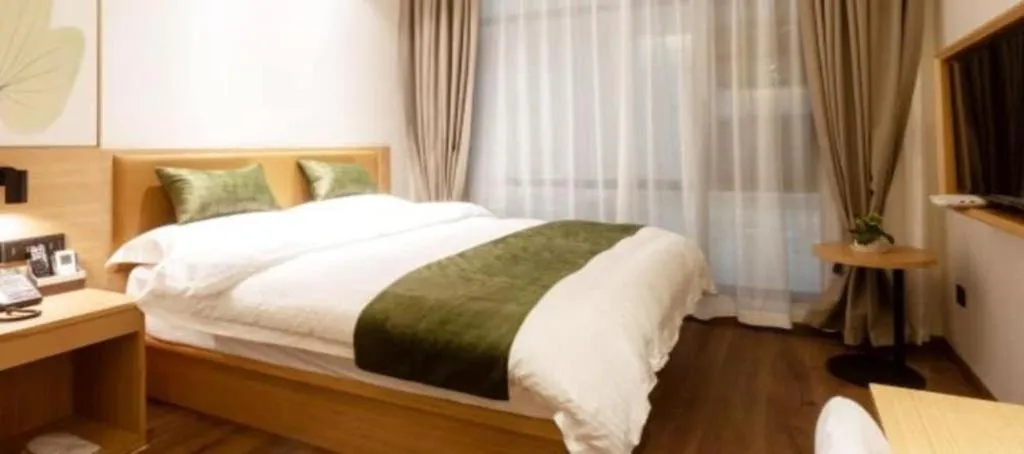 Bed in GreenTree Inn Jiangxi Nanchang XianGYAng Road Lianxi Road Business Hotel