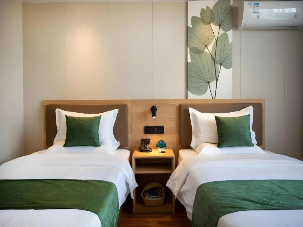 Bed in GreenTree Inn Jiangxi Nanchang XianGYAng Road Lianxi Road Business Hotel