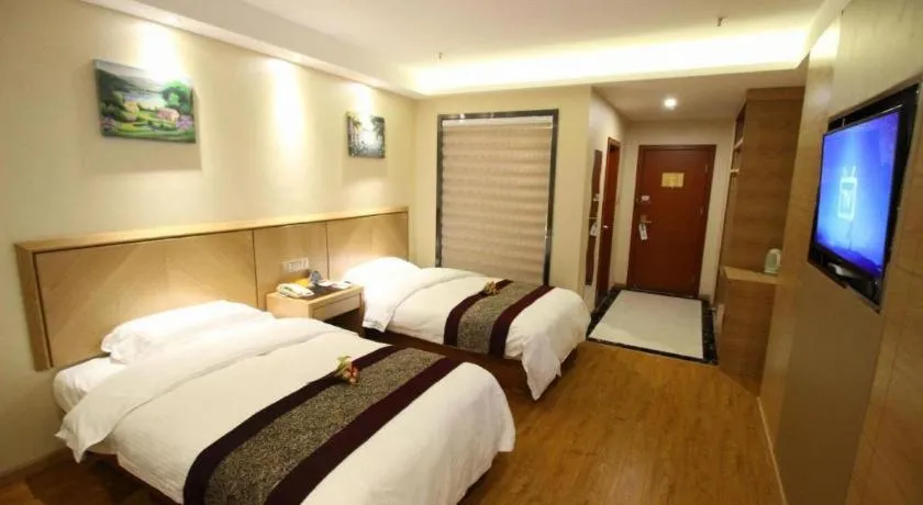 Bed in GreenTree Inn Jiangsu Wuxi Huishan High-Speed Rail Qianzhou Chongwen Road Business Hotel