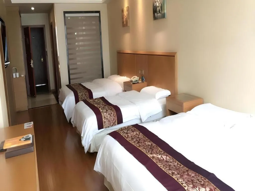 Bed in GreenTree Inn Jiangsu Wuxi Huishan High-Speed Rail Qianzhou Chongwen Road Business Hotel