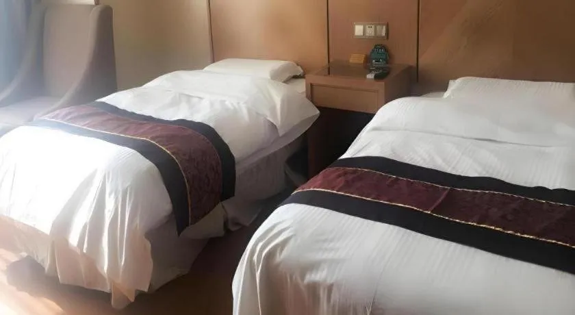 Bed in GreenTree Inn Jiangsu Wuxi Huishan High-Speed Rail Qianzhou Chongwen Road Business Hotel