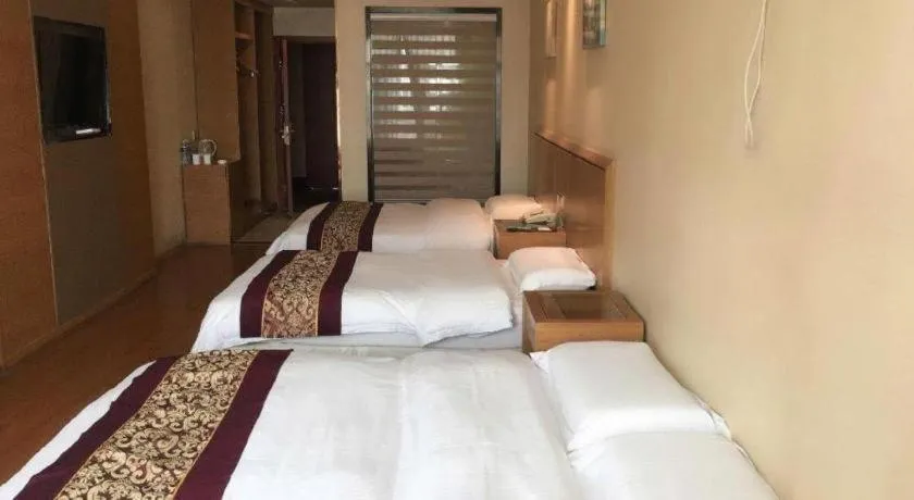 Bed in GreenTree Inn Jiangsu Wuxi Huishan High-Speed Rail Qianzhou Chongwen Road Business Hotel