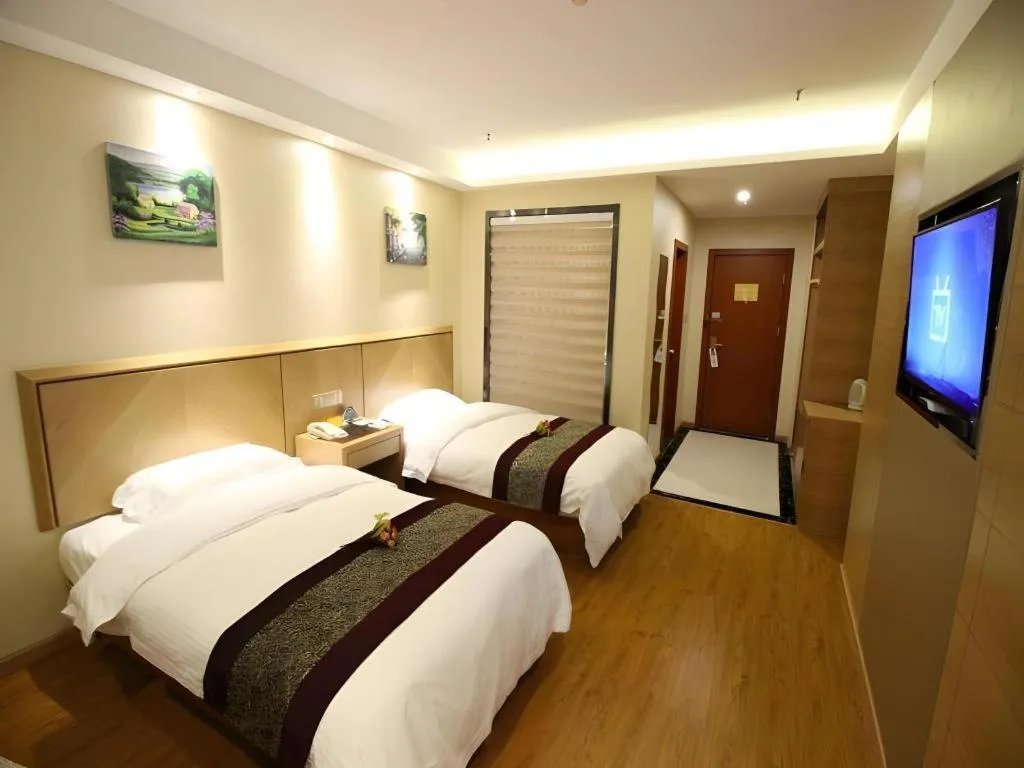 Bed in GreenTree Inn Jiangsu Wuxi Huishan High-Speed Rail Qianzhou Chongwen Road Business Hotel