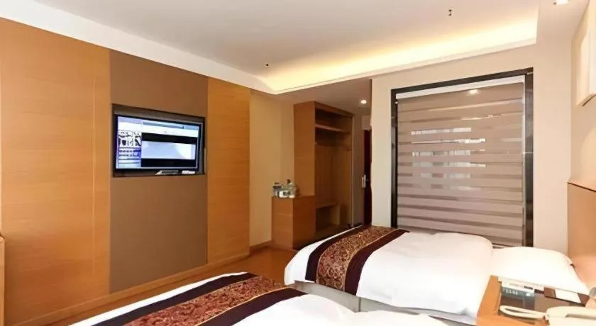 Bed in GreenTree Inn Jiangsu Wuxi Huishan High-Speed Rail Qianzhou Chongwen Road Business Hotel