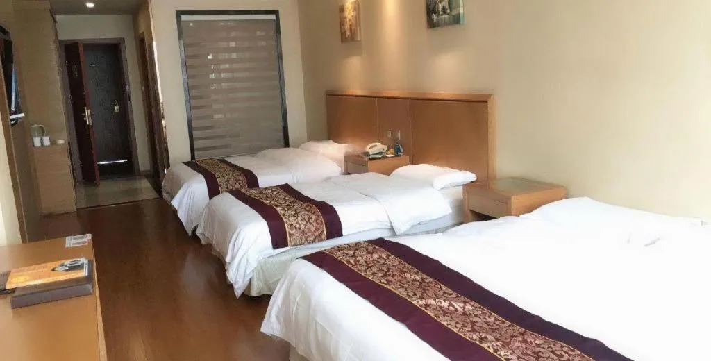 Bed in GreenTree Inn Jiangsu Wuxi Huishan High-Speed Rail Qianzhou Chongwen Road Business Hotel