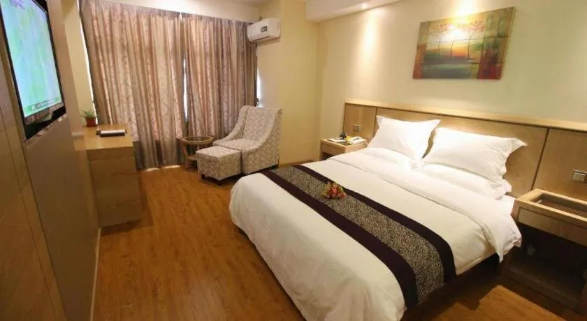 Bed in GreenTree Inn Jiangsu Wuxi Huishan High-Speed Rail Qianzhou Chongwen Road Business Hotel