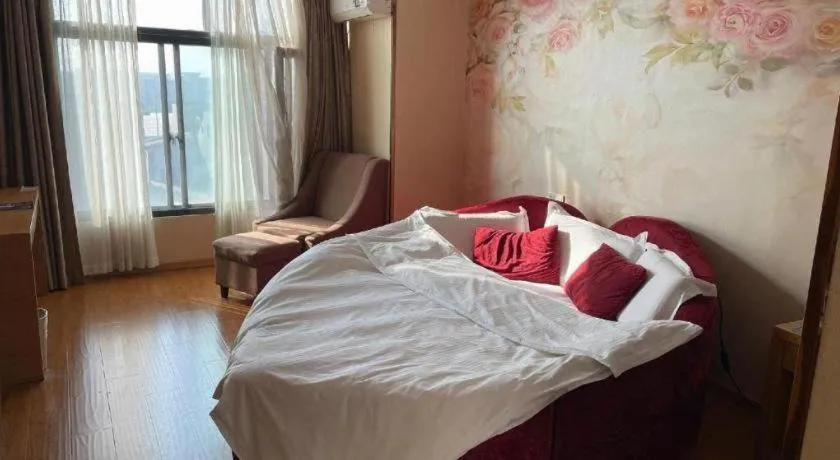 Bed in GreenTree Inn Jiangsu Wuxi Huishan High-Speed Rail Qianzhou Chongwen Road Business Hotel