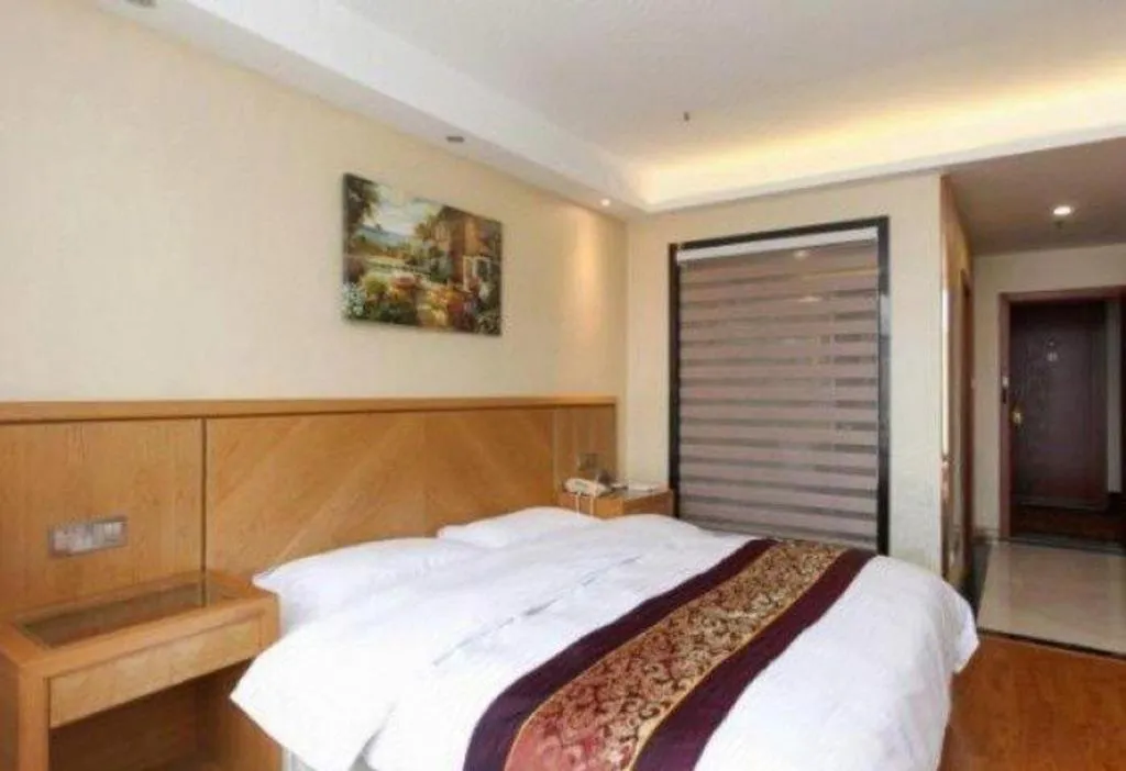 Bed in GreenTree Inn Jiangsu Wuxi Huishan High-Speed Rail Qianzhou Chongwen Road Business Hotel