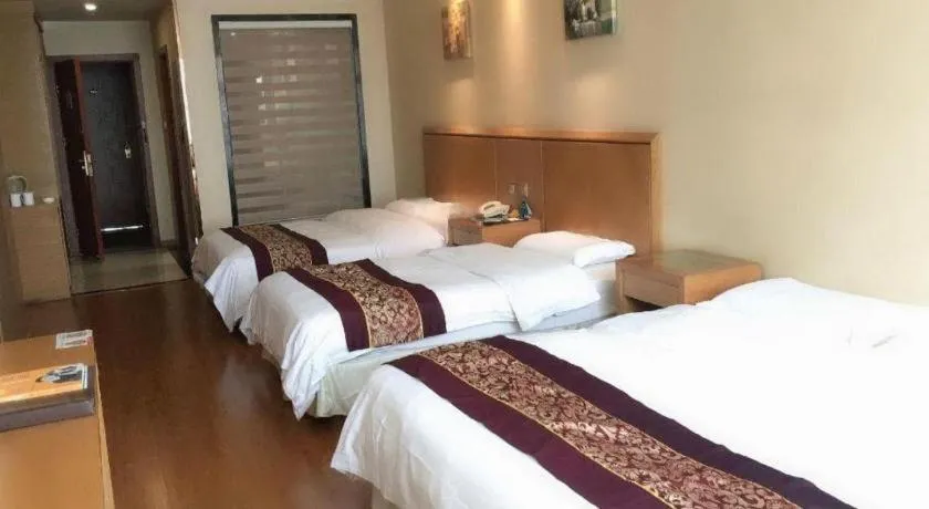 Bed in GreenTree Inn Jiangsu Wuxi Huishan High-Speed Rail Qianzhou Chongwen Road Business Hotel