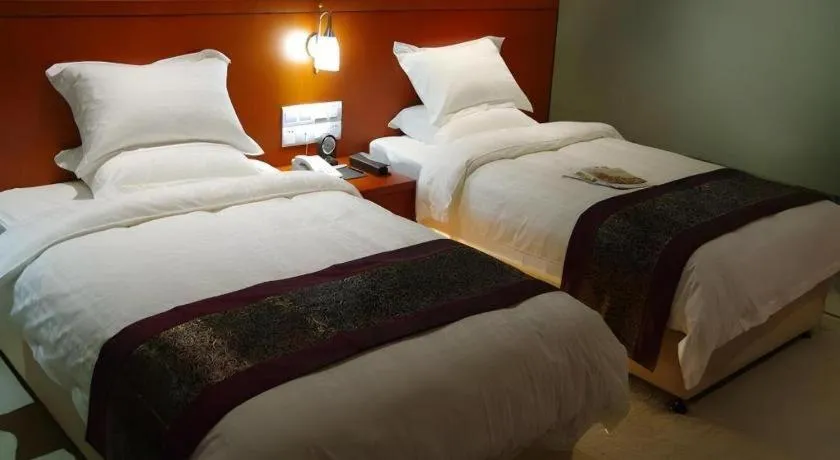 Bed in Sunparkview Hotel Shanghai