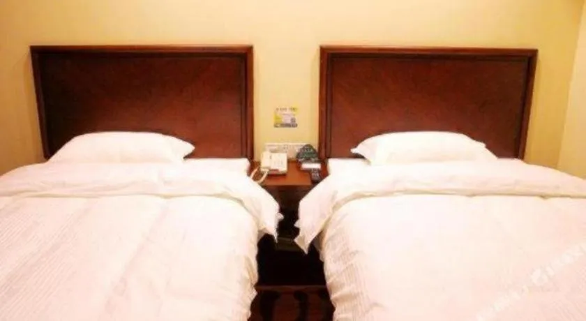 Bed in GreenTree Inn Qingdao Licang Shuyan Road Daweng Square Express Hotel