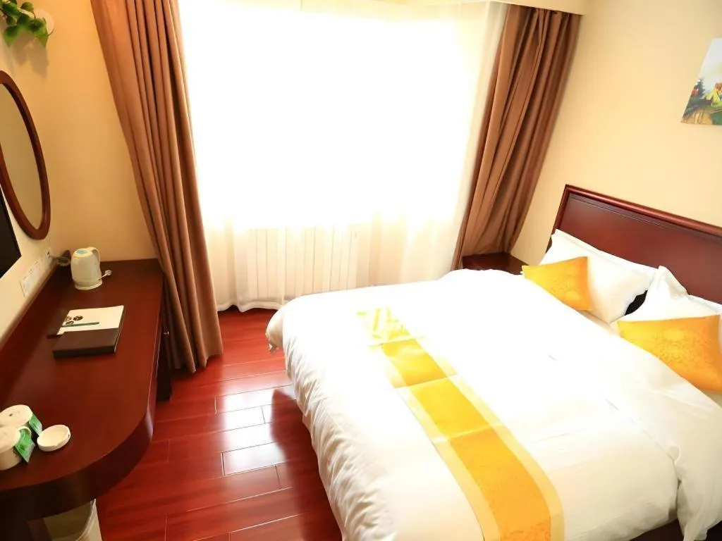 Bed in GreenTree Inn Qingdao Licang Shuyan Road Daweng Square Express Hotel