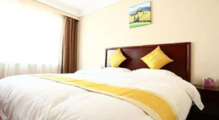 Bed in GreenTree Inn Qingdao Licang Shuyan Road Daweng Square Express Hotel
