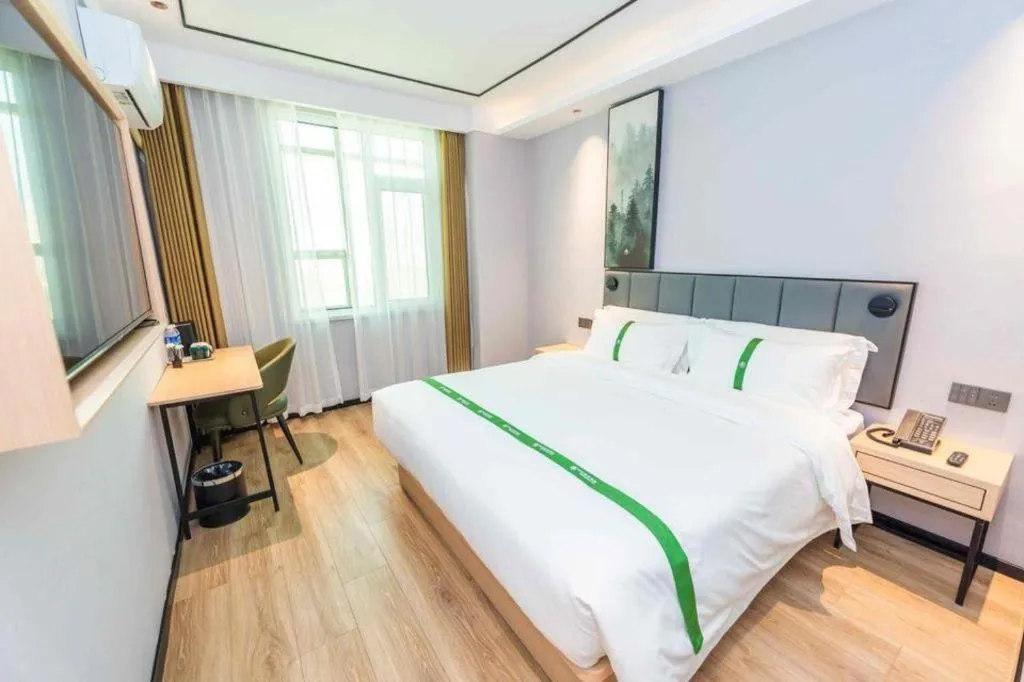 Bed in GreenTree Inn Qingdao Licang Shuyan Road Daweng Square Express Hotel