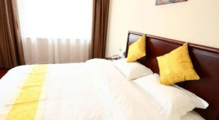 Bed in GreenTree Inn Qingdao Licang Shuyan Road Daweng Square Express Hotel