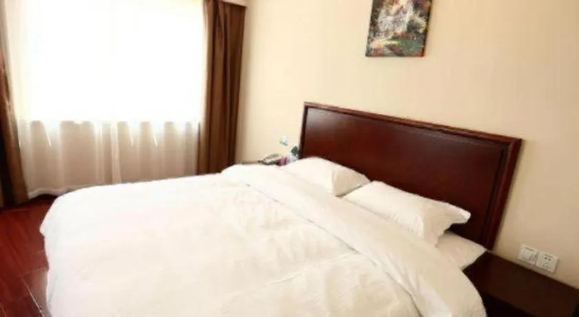 Bed in GreenTree Inn Qingdao Licang Shuyan Road Daweng Square Express Hotel