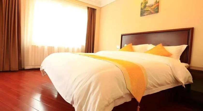 Bed in GreenTree Inn Qingdao Licang Shuyan Road Daweng Square Express Hotel