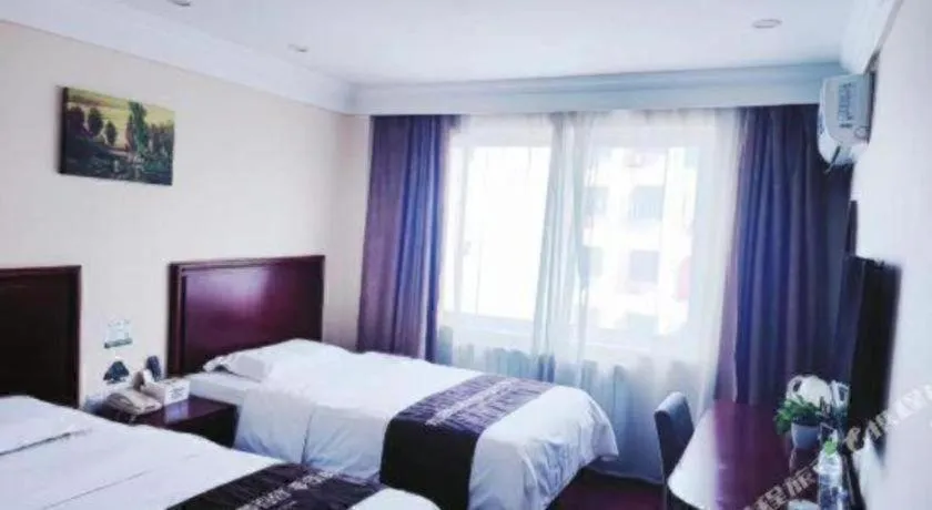 Bed in GreenTree Inn Qingdao Licang Shuyan Road Daweng Square Express Hotel